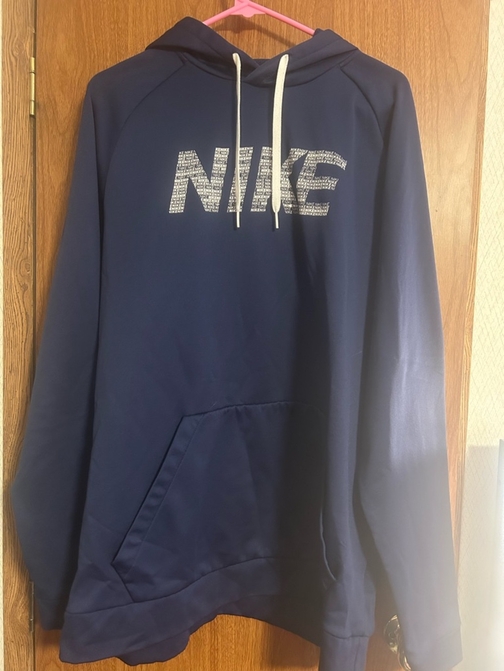 Nike Navy Pullover Hoodie with White Logo and Drawstrings